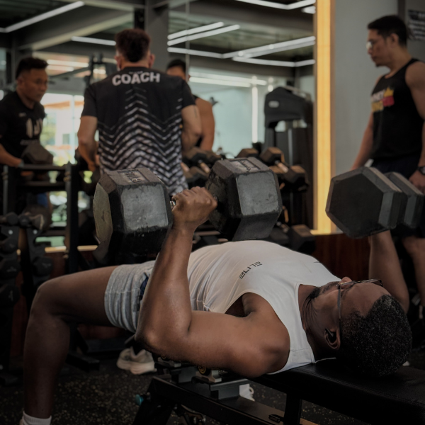 a man lifting and doing chest exercise at lift athletics cagayan de oro fitness gym