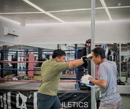 Lift Athletics boxing coach training a member